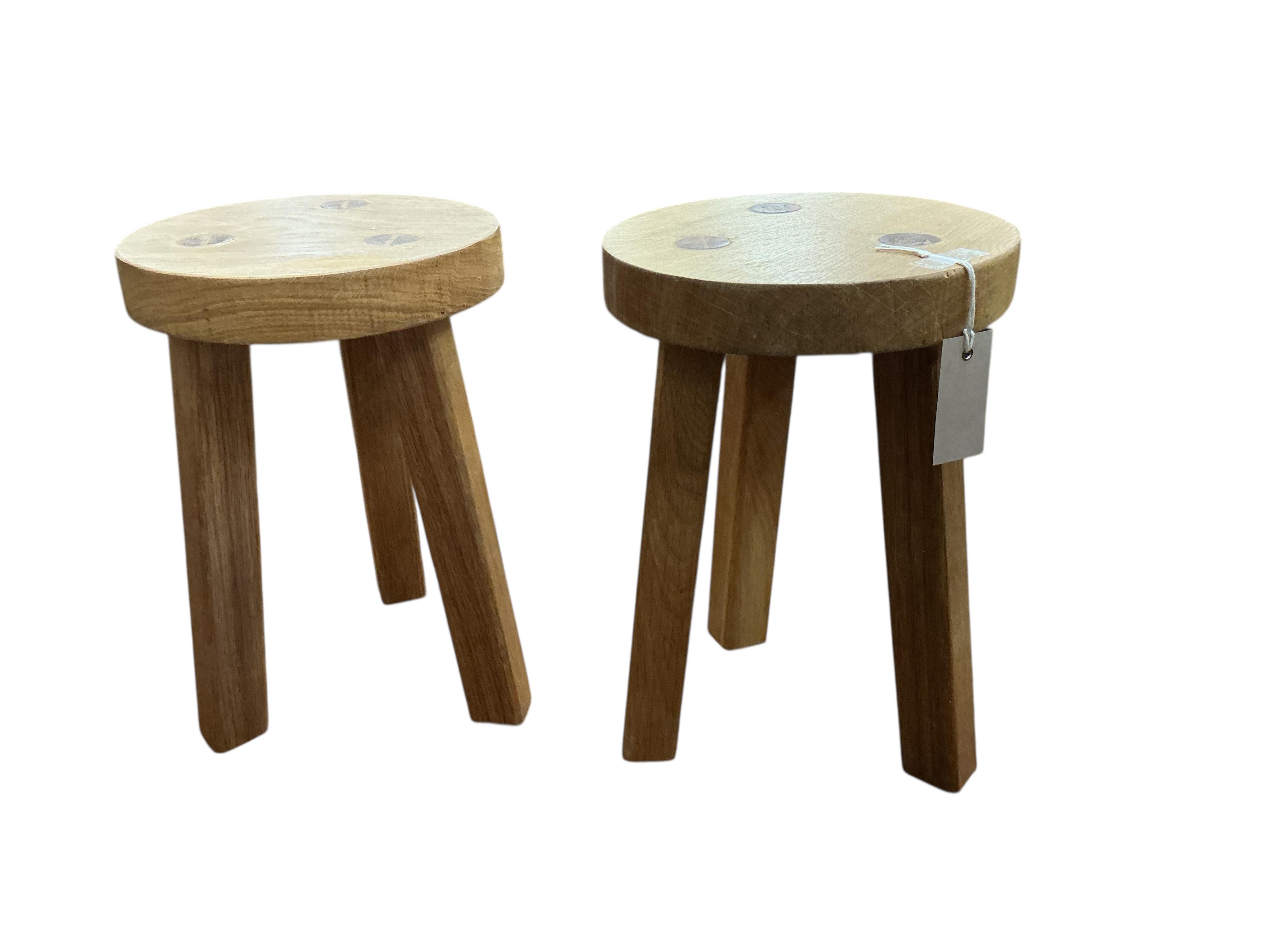 A pair of contemporary circular oak stools, diameter 24cm, height 36cm